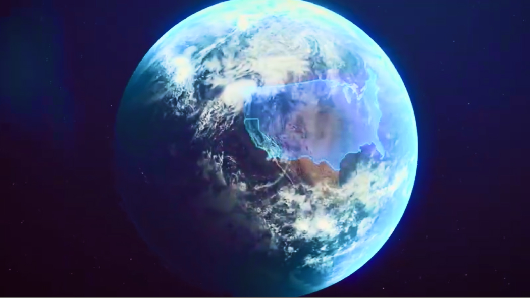 Una imagen fija de vídeo mostrando el planeta Tierra desde el espacio rodeado de un fondo azul